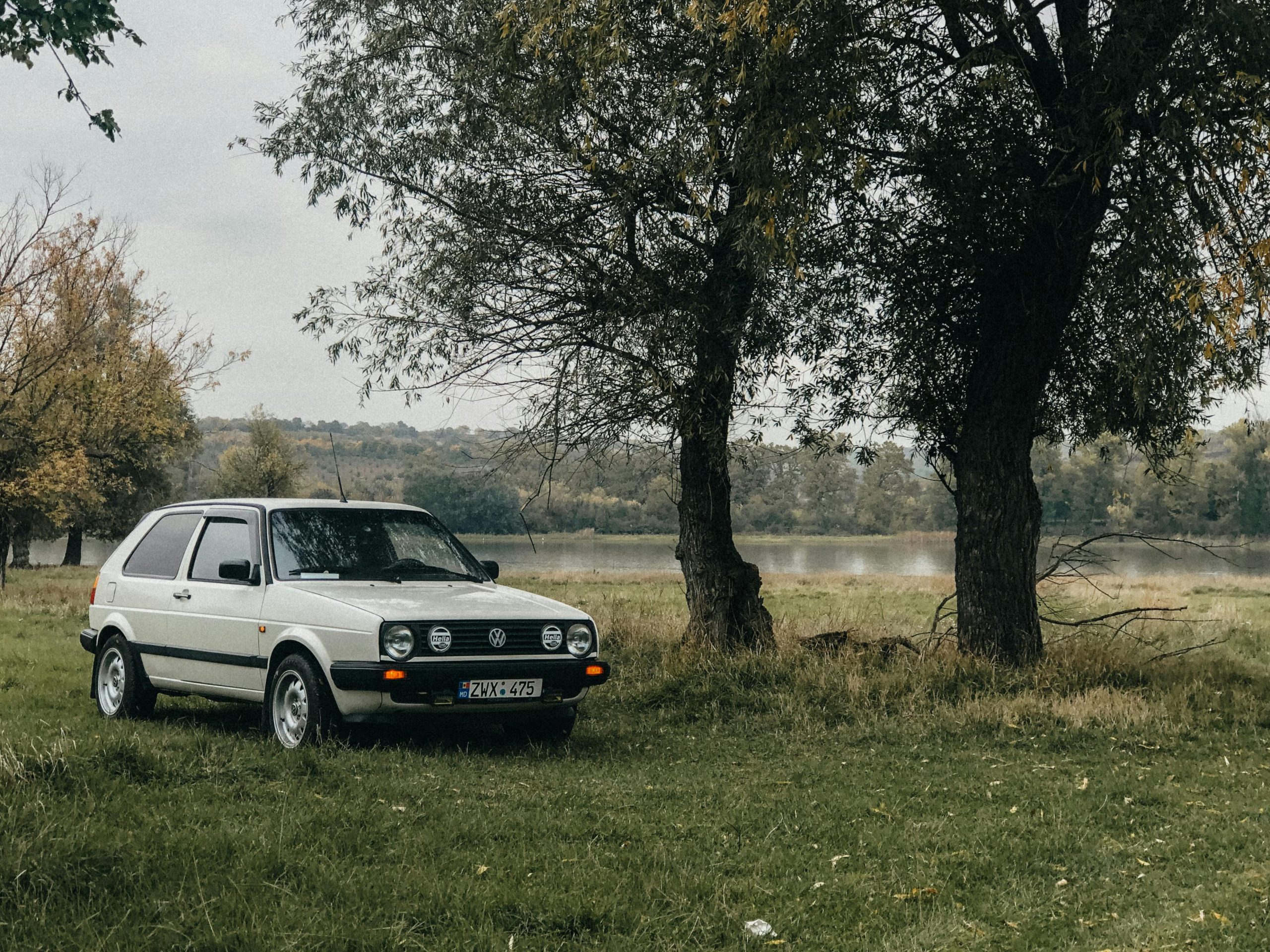 Volkswagen Golf Parked Near a Lake